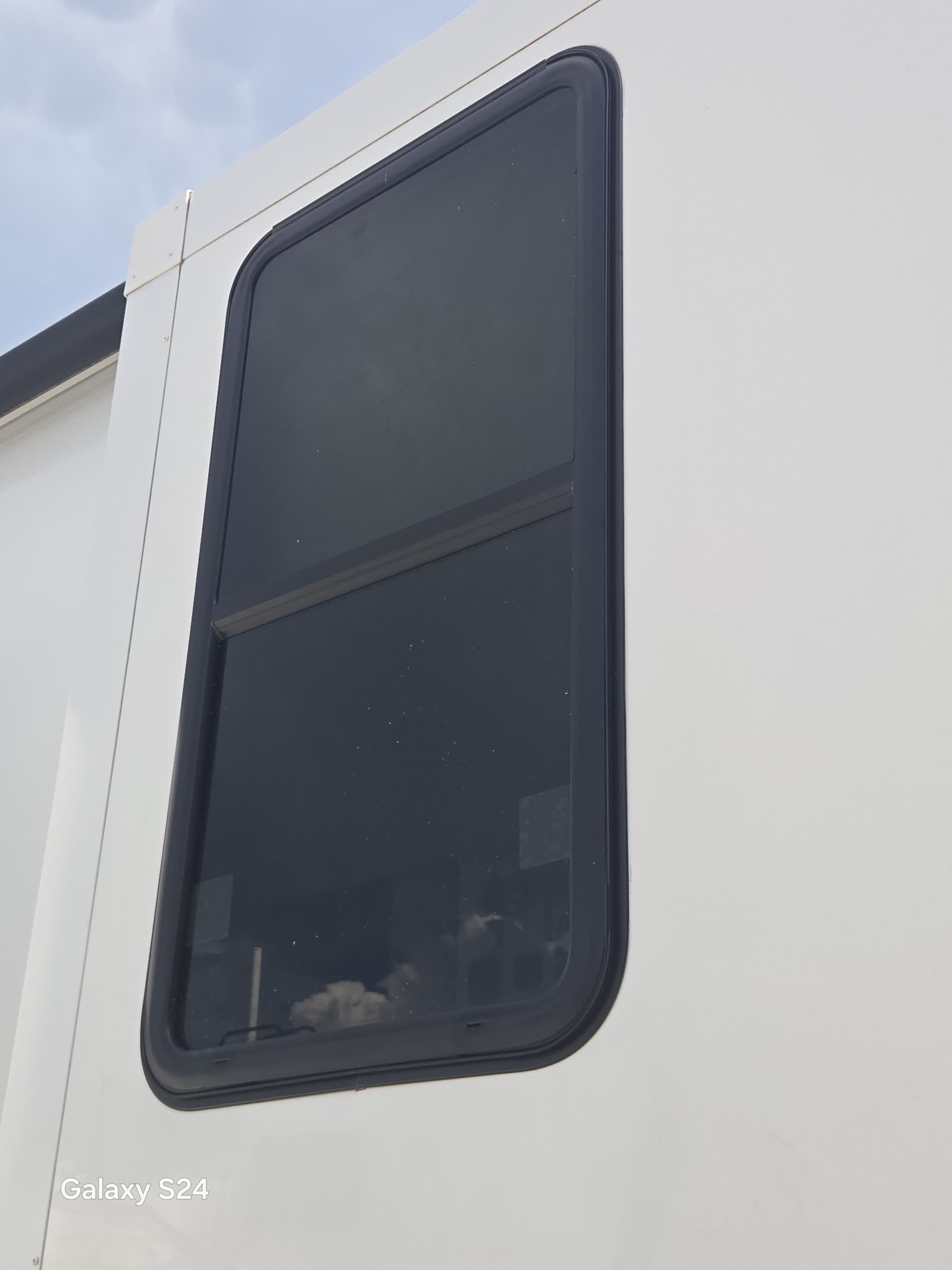 RV window being replaced during a mobile repair visit in Sarasota, FL